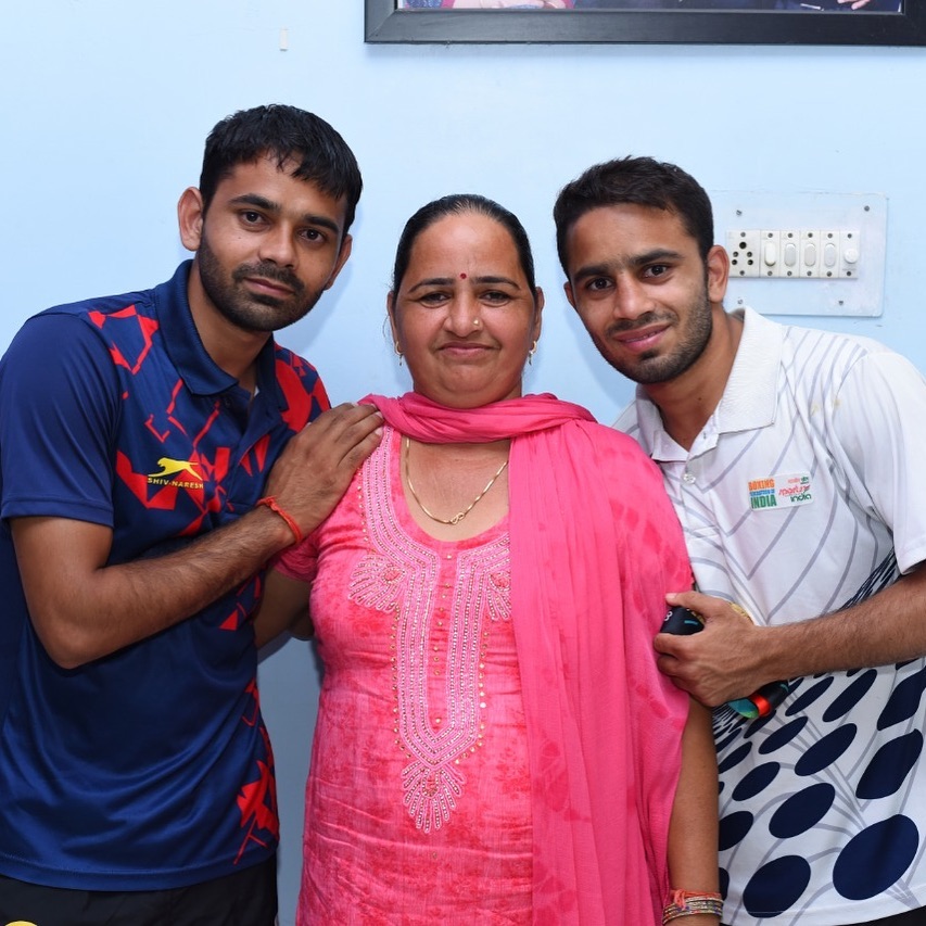 Ajay and Amit with her mother