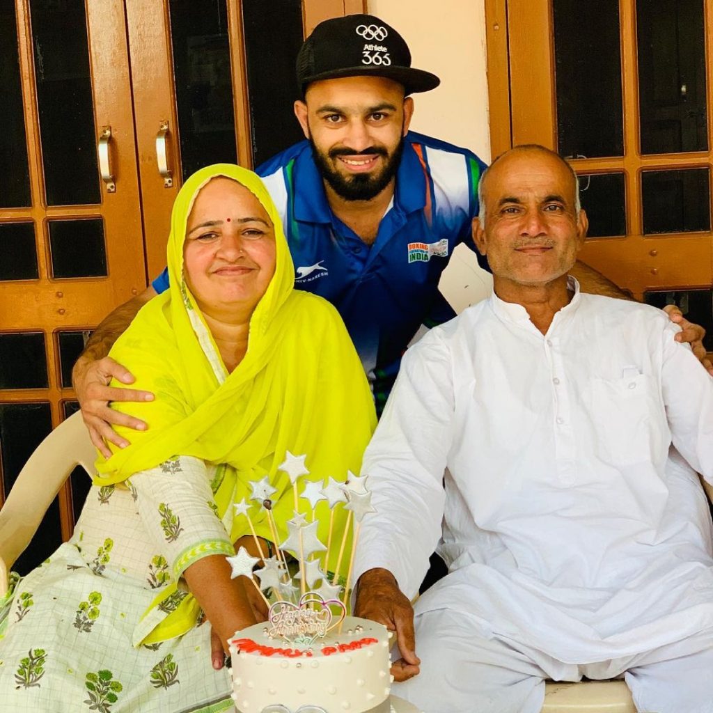 Amit Panghal With her parents