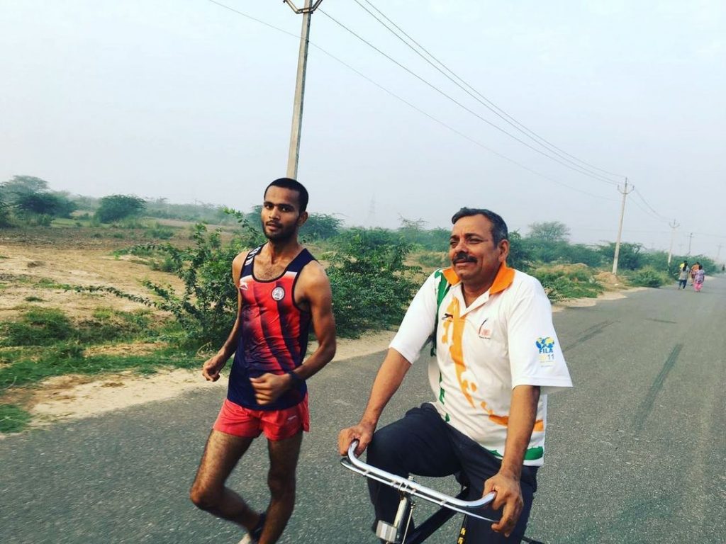 Rahul Rohilla with his coach Charan Singh Rathi