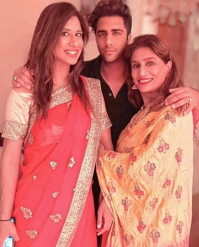 Rajiv Adatia with his mother and sister